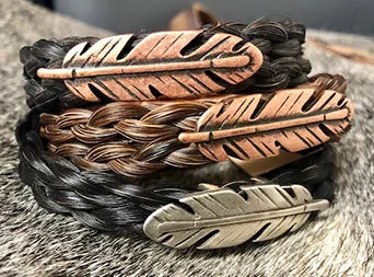 Men's western boots with a decorative concho belt and buckleHorse Hair Feather Bracelet