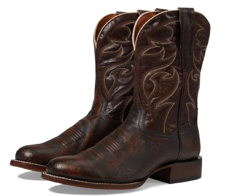 Men's western boots with a concho - studded strap and a pointed toeDan Post Men's Clyde Boot